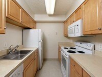 Maple Scheme Kitchen - AVA Van Ness Apartments in Washington, District of Columbia