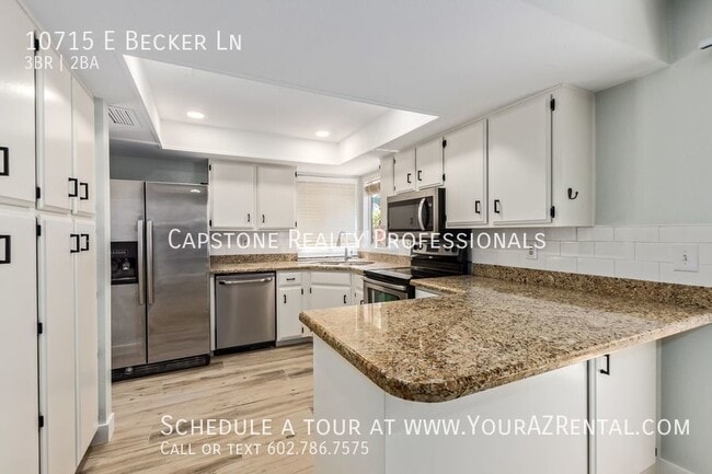 property at 10715 E Becker Ln