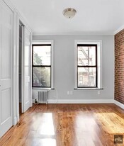 E 1ST ST. in New York, NY - Building Photo