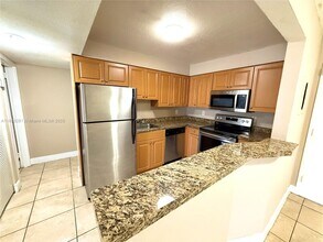 5112 NW 79th Ave in Doral, FL - Building Photo - Building Photo