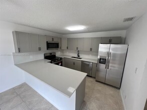 110 San Remo Blvd in North Lauderdale, FL - Building Photo - Building Photo