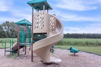 CHILDREN'S PLAY AREA - Foster Collier Gordon Manor Apartments in Marianna, Arkansas