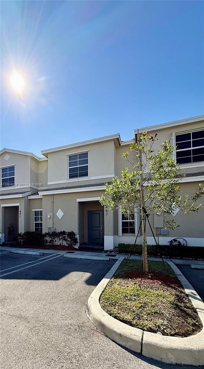 property at 487 NE 5th St