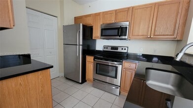 8000 N Nob Hill Rd in Tamarac, FL - Building Photo - Building Photo