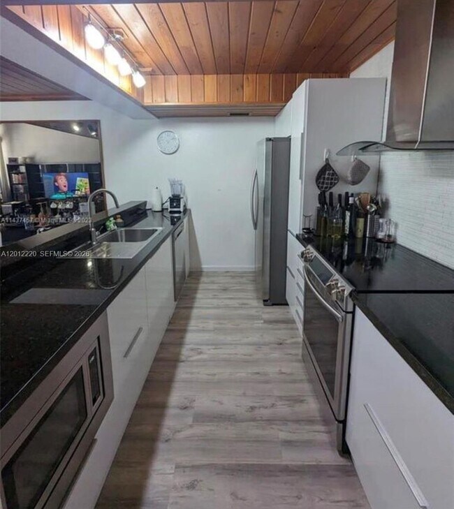 property at 11203 NW 15th St