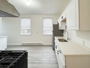 620 River St, Unit Top in Boston, MA - Foto de edificio - Building Photo