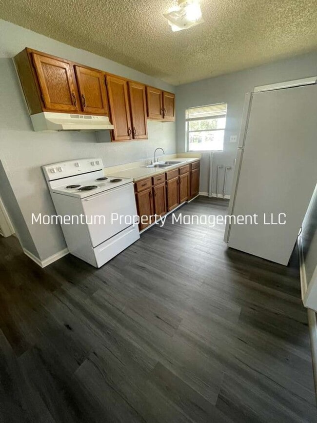 property at 203 NE 2nd St