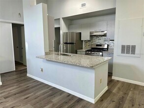 1606 Columbia Arms Cir, Unit 223 in Kissimmee, FL - Building Photo - Building Photo