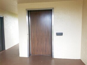 7710 NW 50th St, Unit 307 in Lauderhill, FL - Building Photo - Building Photo