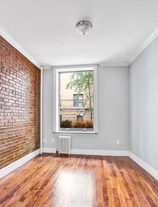 property at 199 E 3rd St