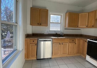 27 Holman St, Unit 1 in Boston, MA - Foto de edificio - Building Photo
