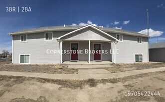 214 Chapman St in Wiggins, CO - Building Photo
