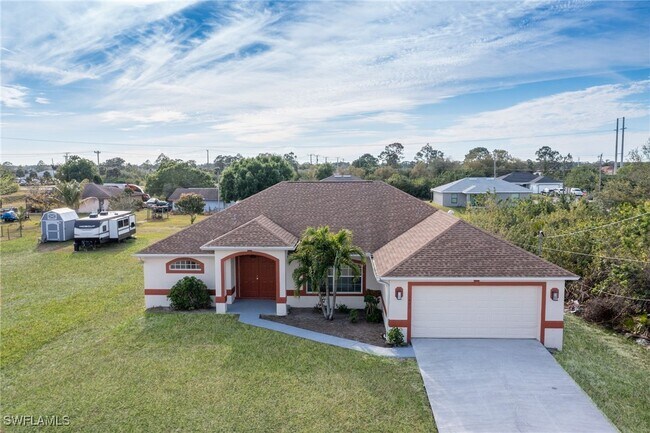 1402 Fred Ave S in Lehigh Acres, FL - Building Photo - Building Photo