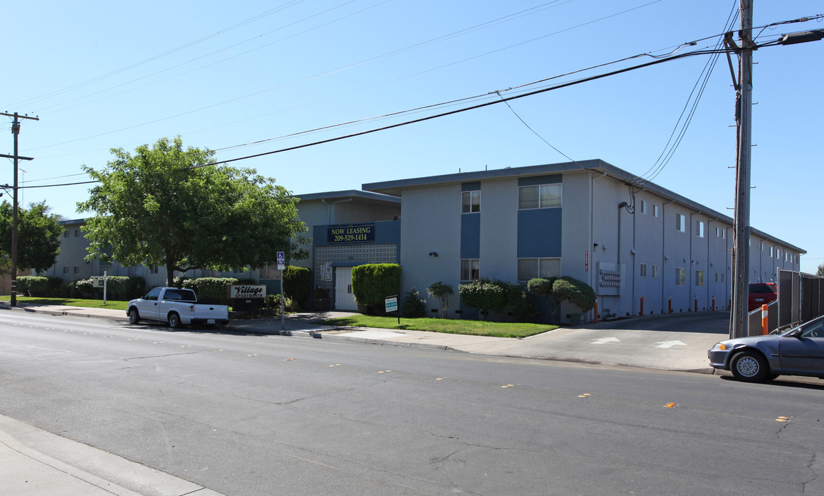 Village Apartments in Modesto, CA - Building Photo