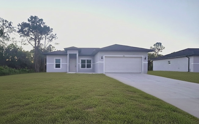444 Genoa Ave S in Lehigh Acres, FL - Building Photo - Building Photo