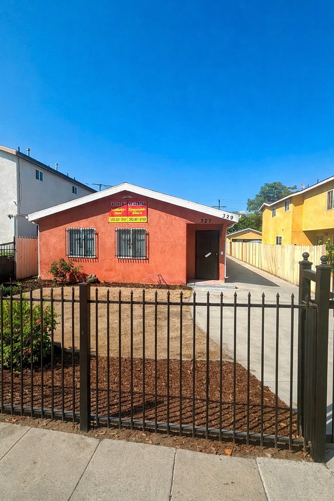 property at 327 E 106th St