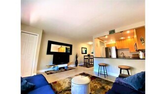 7801 Ridgewood Ave, Unit ModernBeachPad in Cape Canaveral, FL - Building Photo