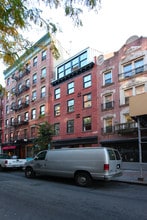 230 Elizabeth St in New York, NY - Building Photo - Building Photo