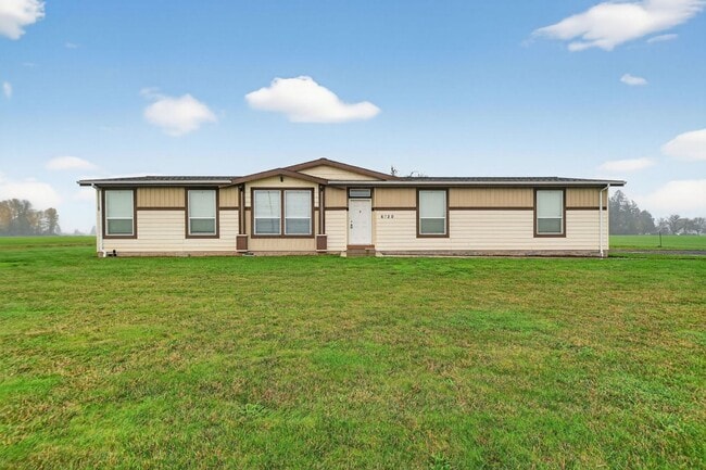 property at 6720 SW Minter Bridge Rd