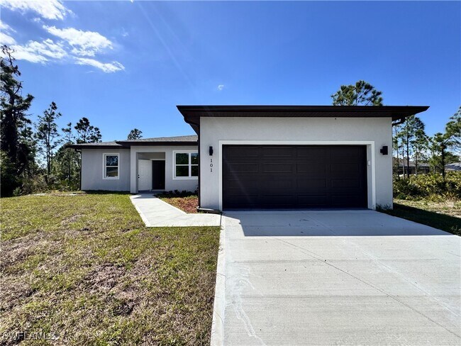 101 Tompkins St in Port Charlotte, FL - Foto de edificio - Building Photo
