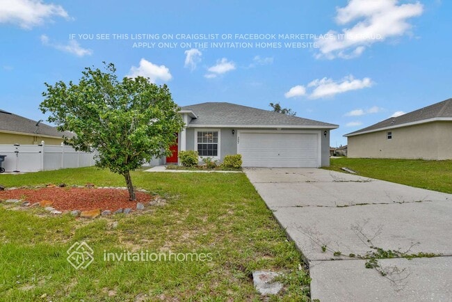207 Dogfish Ln in Poinciana, FL - Foto de edificio - Building Photo