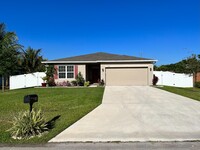 1973 SW Libra Ln in Port St. Lucie, FL - Foto de edificio - Building Photo