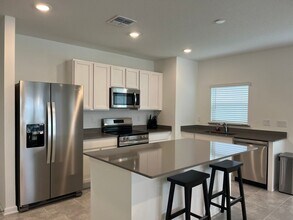 7067 Sienna Oak Aly in Orlando, FL - Building Photo - Building Photo