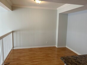 380 W Wilson St, Unit F104 in Costa Mesa, CA - Building Photo - Building Photo