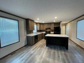 88 Normandy Dr in Howell, MI - Foto de edificio - Building Photo