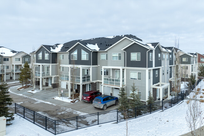 Arrive at Red Stone Way in Calgary, AB - Building Photo - Building Photo