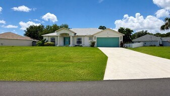 1002 SW Longfellow Rd in Port St. Lucie, FL - Building Photo