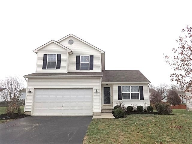 566 Virginia St in Ashville, OH - Building Photo
