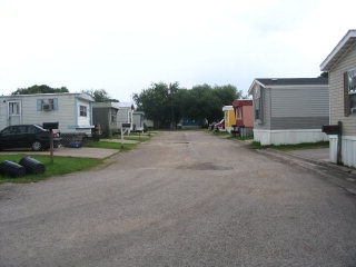 Angleton Oaks Mobile Home Village in Angleton, TX - Building Photo - Building Photo