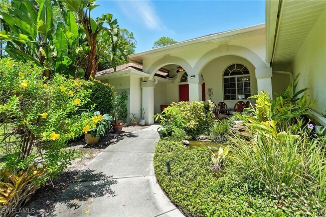 5891 Golden Oaks Ln in Naples, FL - Building Photo - Building Photo
