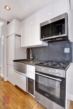 410 E 13th St in New York, NY - Building Photo - Building Photo