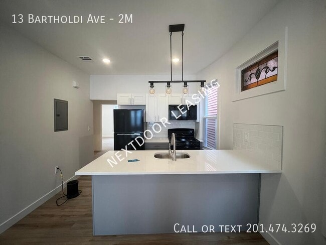 property at 13 Bartholdi Ave