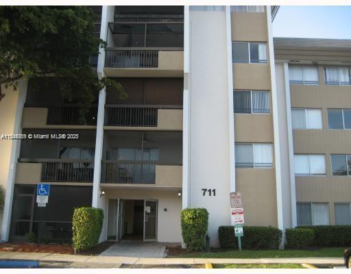 property at 711 N Pine Island Rd