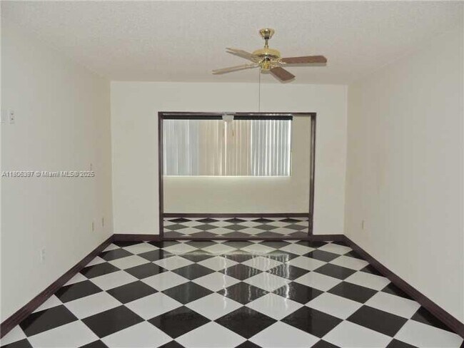 property at 8595 Sunrise Lakes Blvd