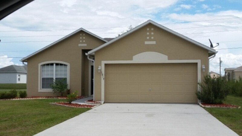 1019 N Platte Way in Poinciana, FL - Building Photo