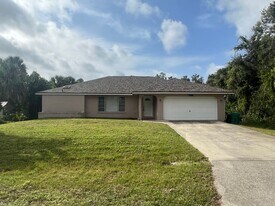 1017 Tropical Ave NW in Port Charlotte, FL - Building Photo