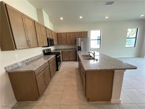 14815 Loggerhead Dr in Naples, FL - Building Photo - Building Photo