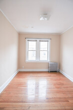 3950 W Roscoe St, Unit 3C in Chicago, IL - Building Photo - Building Photo