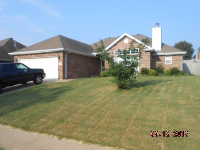 property at 602 SW Maidstone Ave