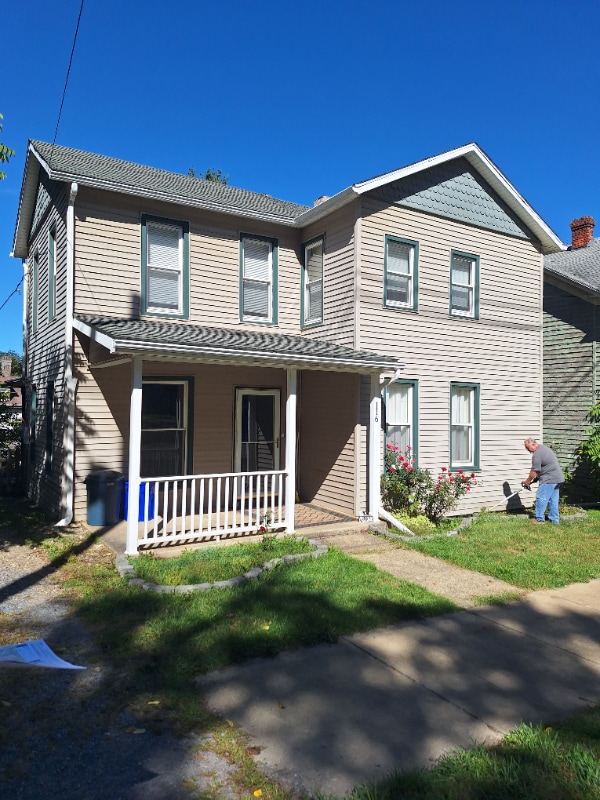 property at 116 W 3rd St