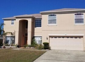 148 Columbia Dr in Poinciana, FL - Building Photo