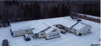 289 Sunset Dr in Beresford, NB - Building Photo