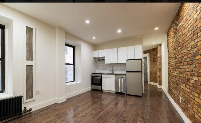 W. 127th St, St Nicholas Pl in New York, NY - Building Photo - Building Photo