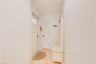 9820 Citadel Ln, Unit 202 in Bonita Springs, FL - Building Photo - Building Photo