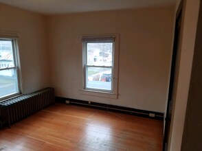 152 W Seneca St-Unit -4 in Oswego, NY - Building Photo - Building Photo