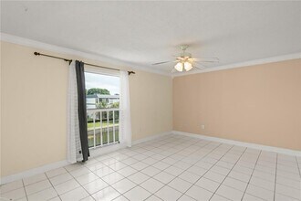 8350 Sands Point Blvd, Unit E309 in Tamarac, FL - Building Photo - Building Photo